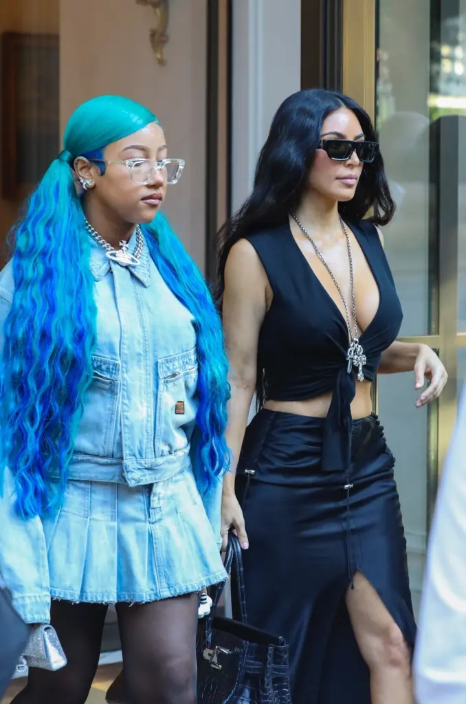 Blue Muse in Denim: North West Stuns in Italy with Matching Hair and Outfit”