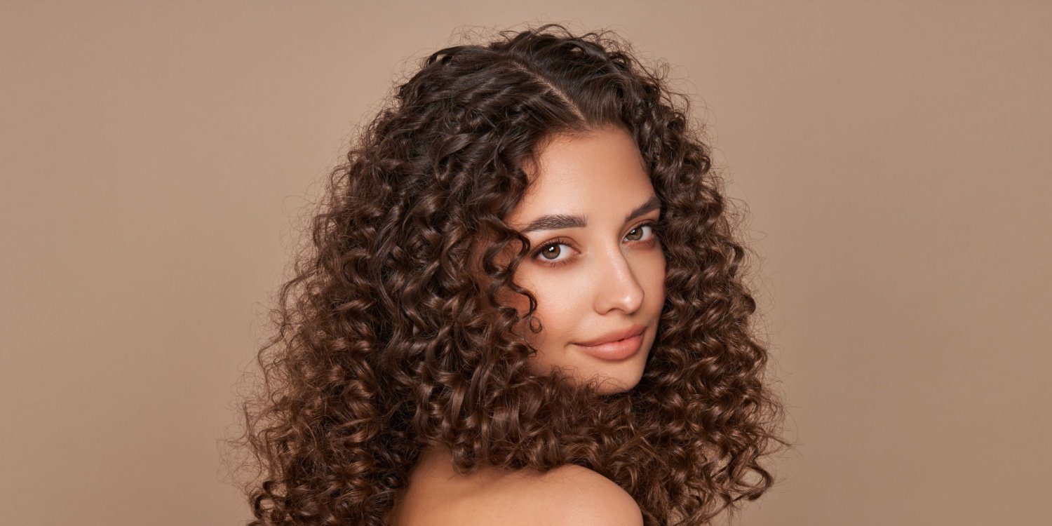 Seven-Day Curly Hair Ritual You Need for Frizz-Free