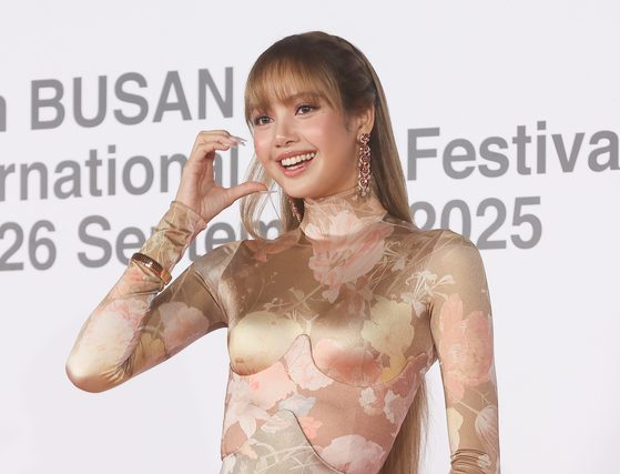 Lisa Stuns at Busan Film Festival in Bold Hip-Exposing Dress