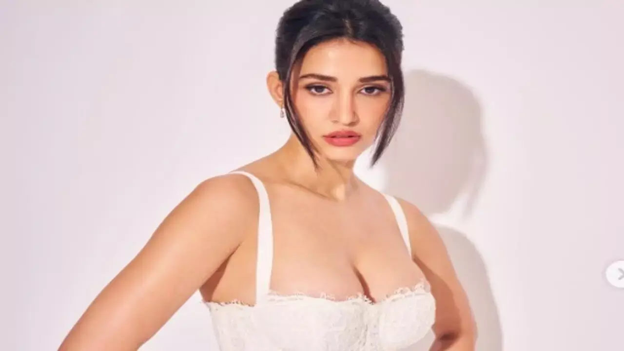 Disha Patani Exudes Elegance in White Lace Dress at Event