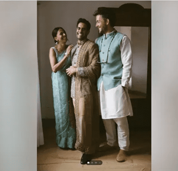 Jonathan Bailey Charms in Nehru Jacket & Grey Suit at a “Desi” Wedding
